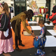 First Lady Michelle Obama with Robeson Perry, 5, at Trick or Treat at the White House, Oct. 31, 2016